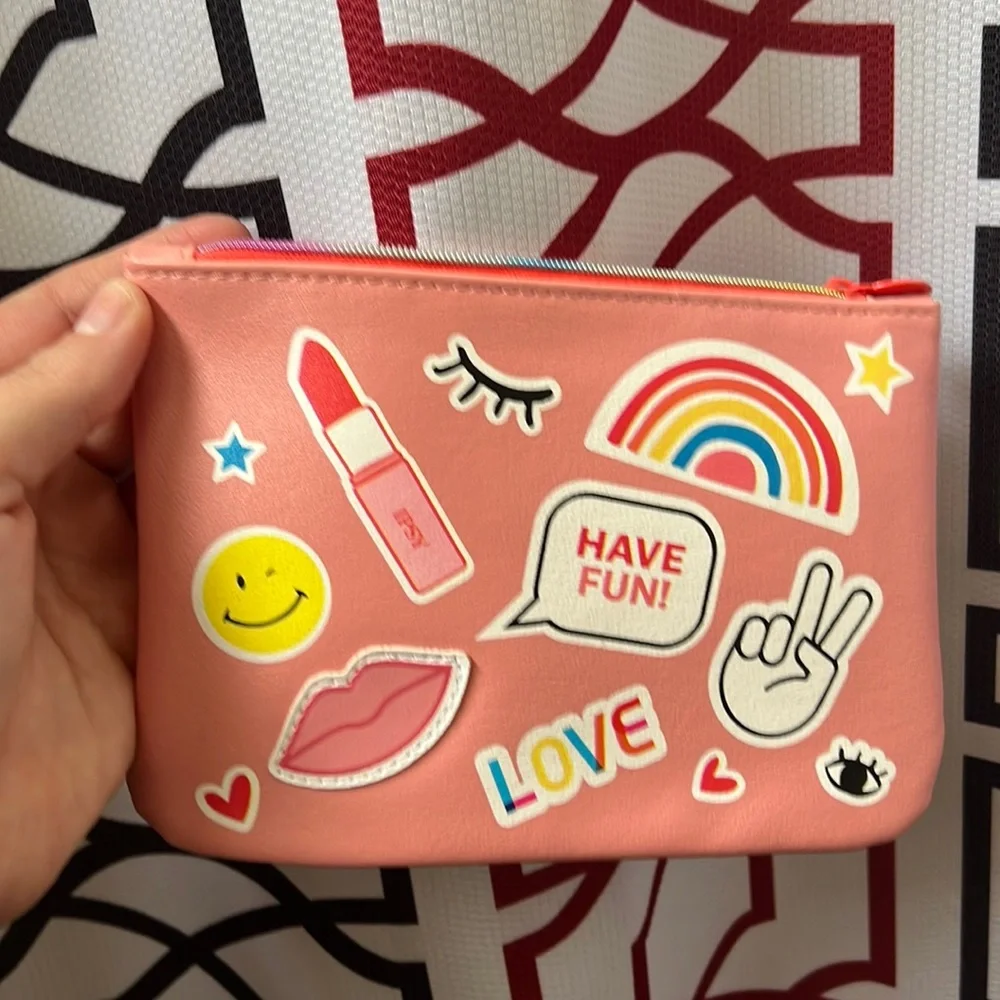 Ipsy zip cosmetic bag or whatever you want to use for